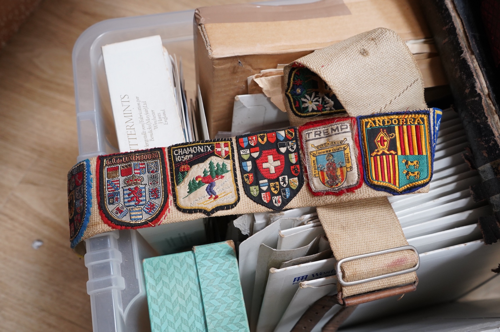 A collection of sundry items to include a scrapbook and a large collection of various stamps